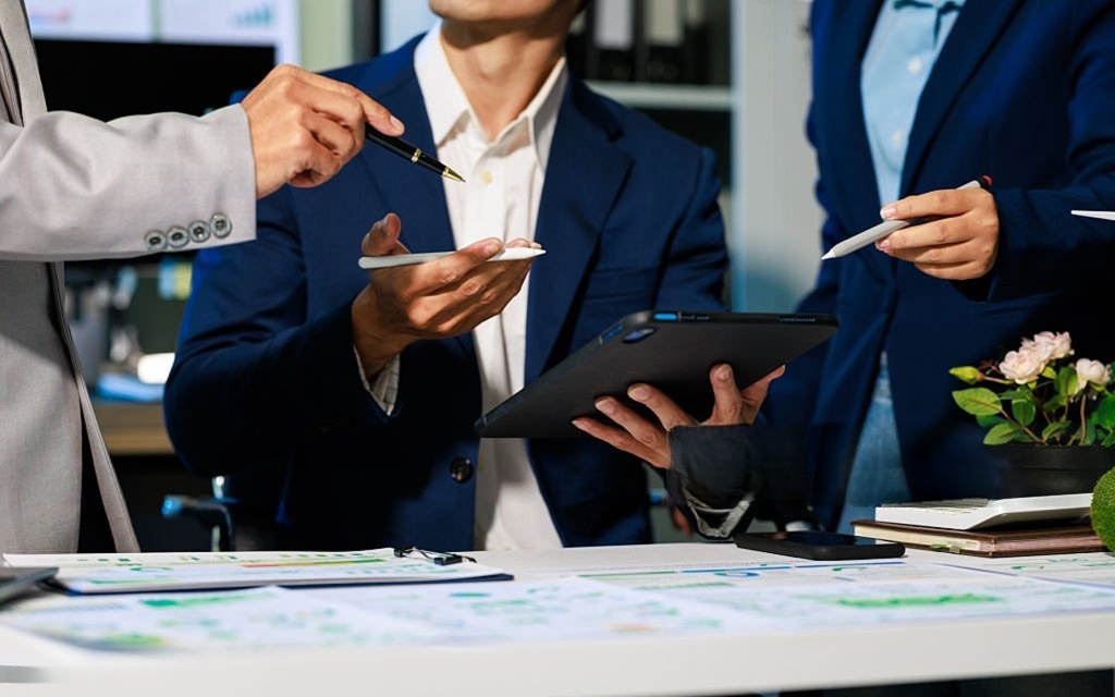 business team reviewing presentation before meeting